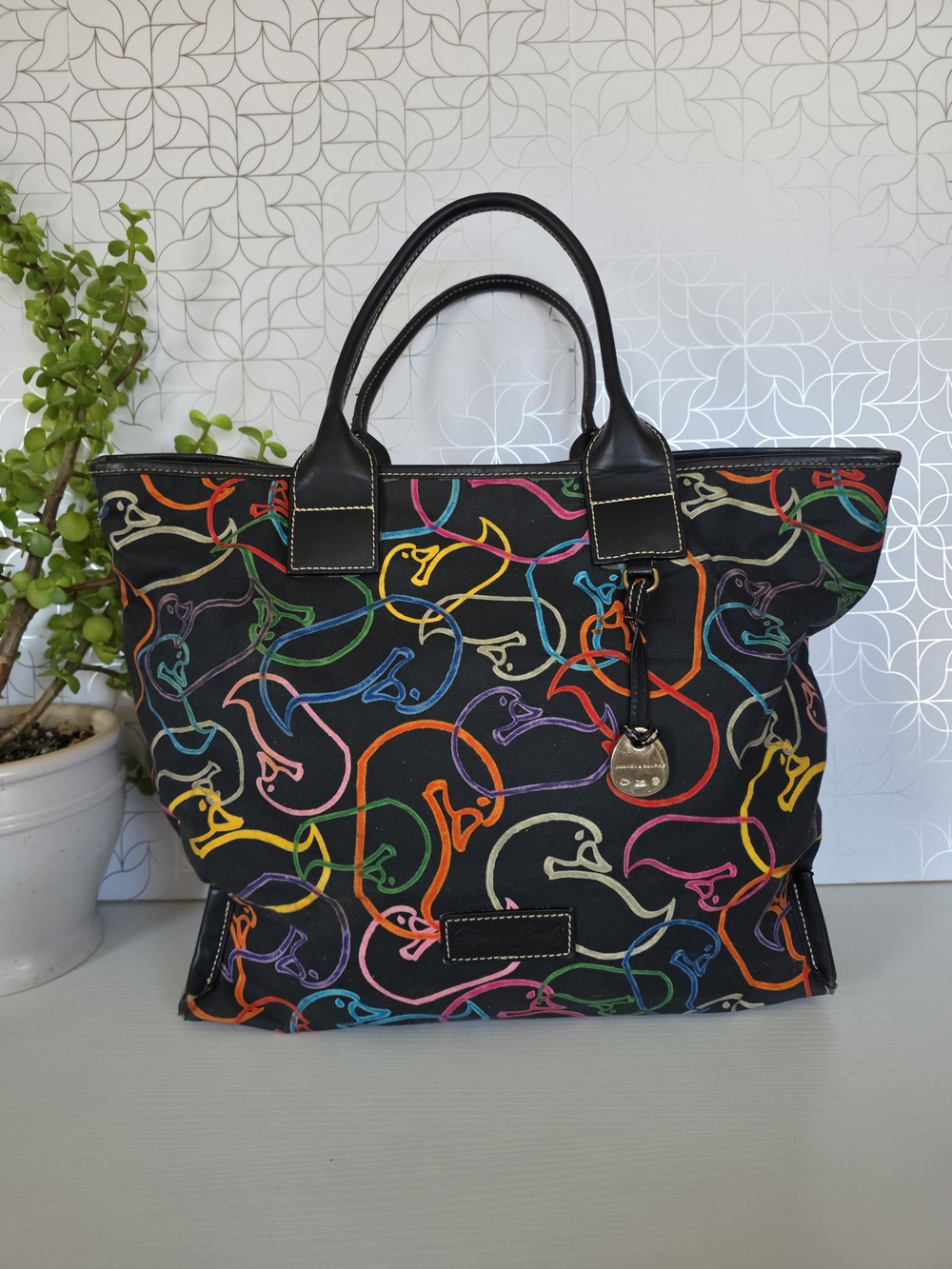 Dooney & Bourke Bella Shopper Tote featuring their signature Multicolor Wonder